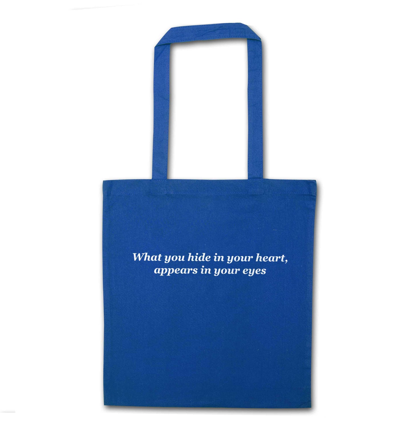 What you hide in your heart, appears in your eyes blue tote bag