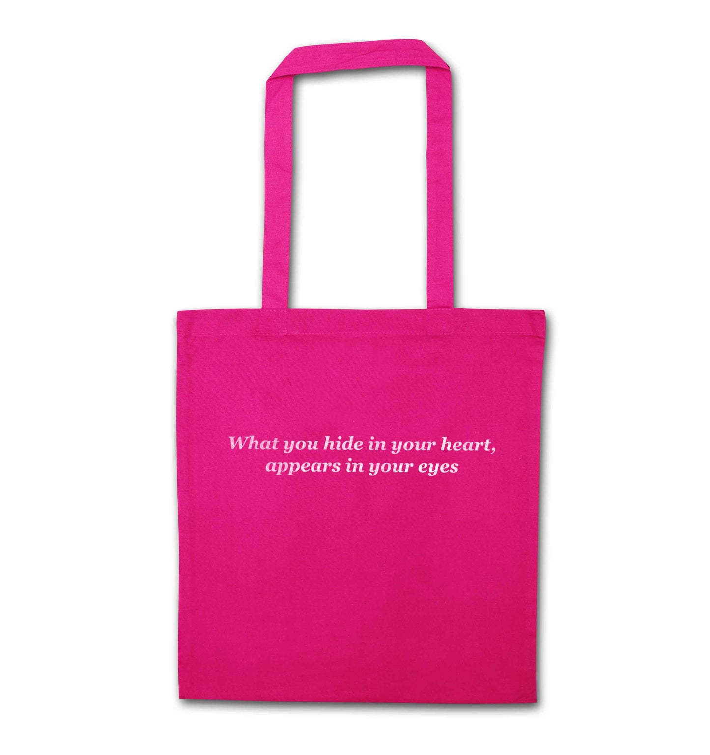 What you hide in your heart, appears in your eyes pink tote bag