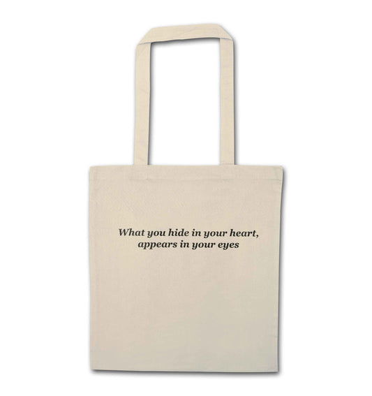 What you hide in your heart, appears in your eyes natural tote bag