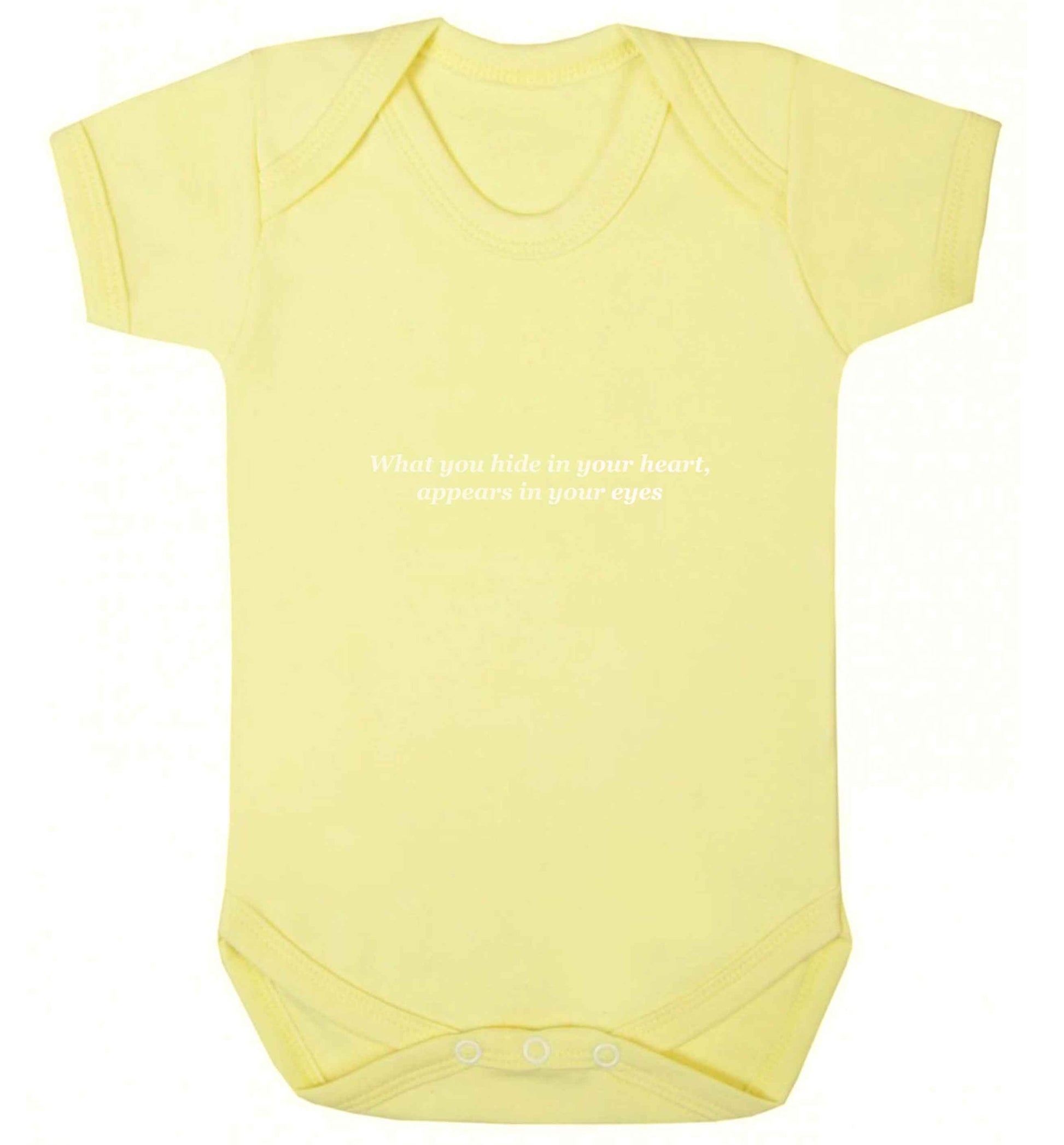 What you hide in your heart, appears in your eyes baby vest pale yellow 18-24 months