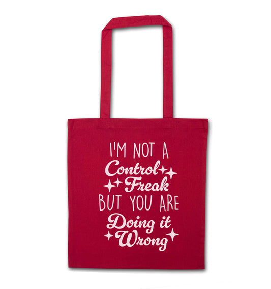 I'm not a control freak but you are doing it wrong red tote bag