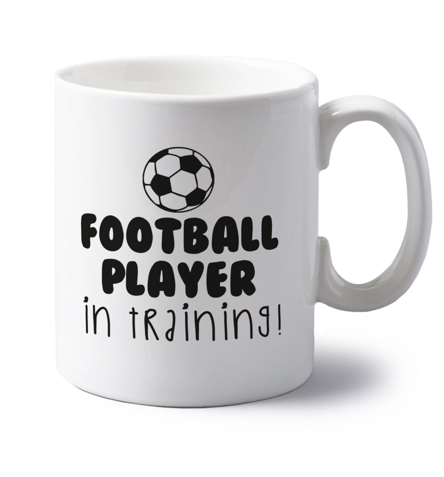 Football player in training left handed white ceramic mug