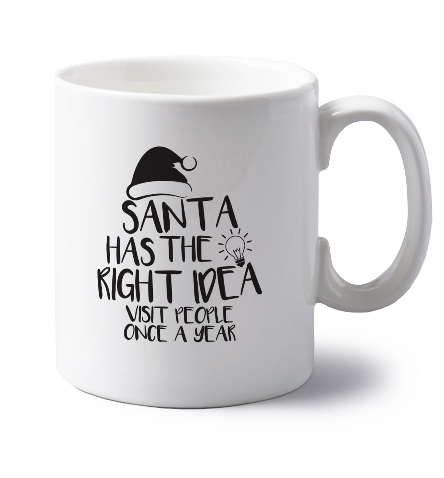 Santa has the right idea visit people once a year left handed white ceramic mug
