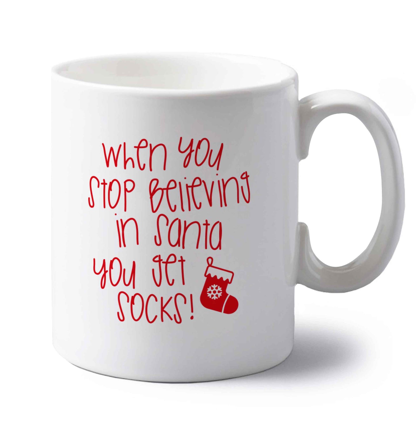 When you stop believing in santa you get socks left handed white ceramic mug