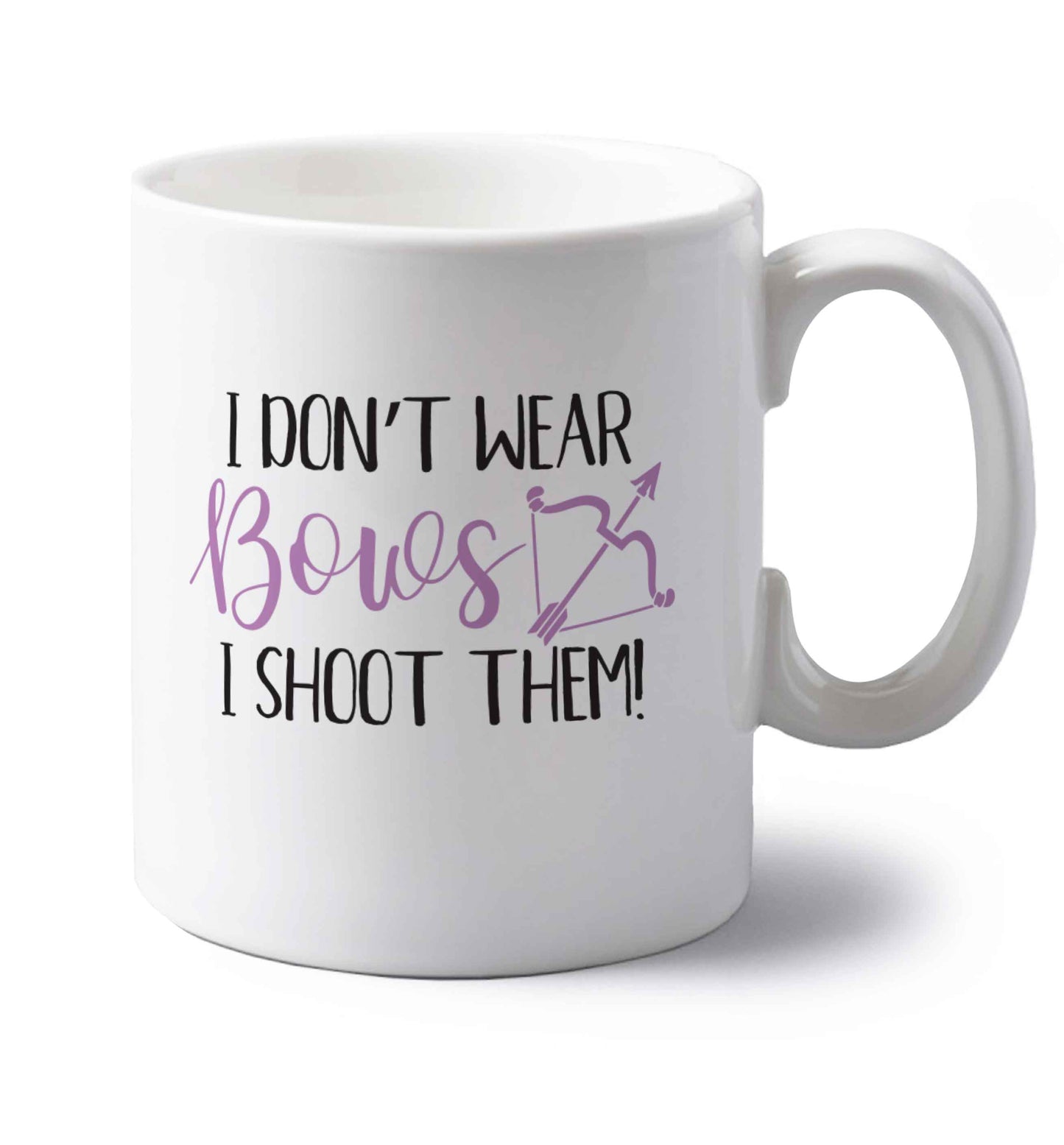 I don't wear bows I shoot them left handed white ceramic mug