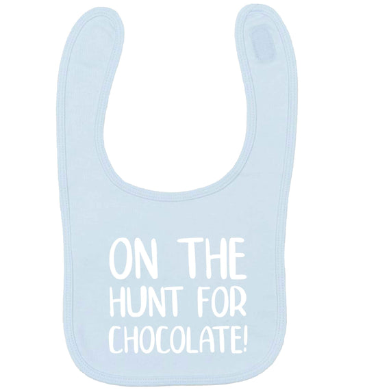 On the hunt for chocolate! pale blue baby bib