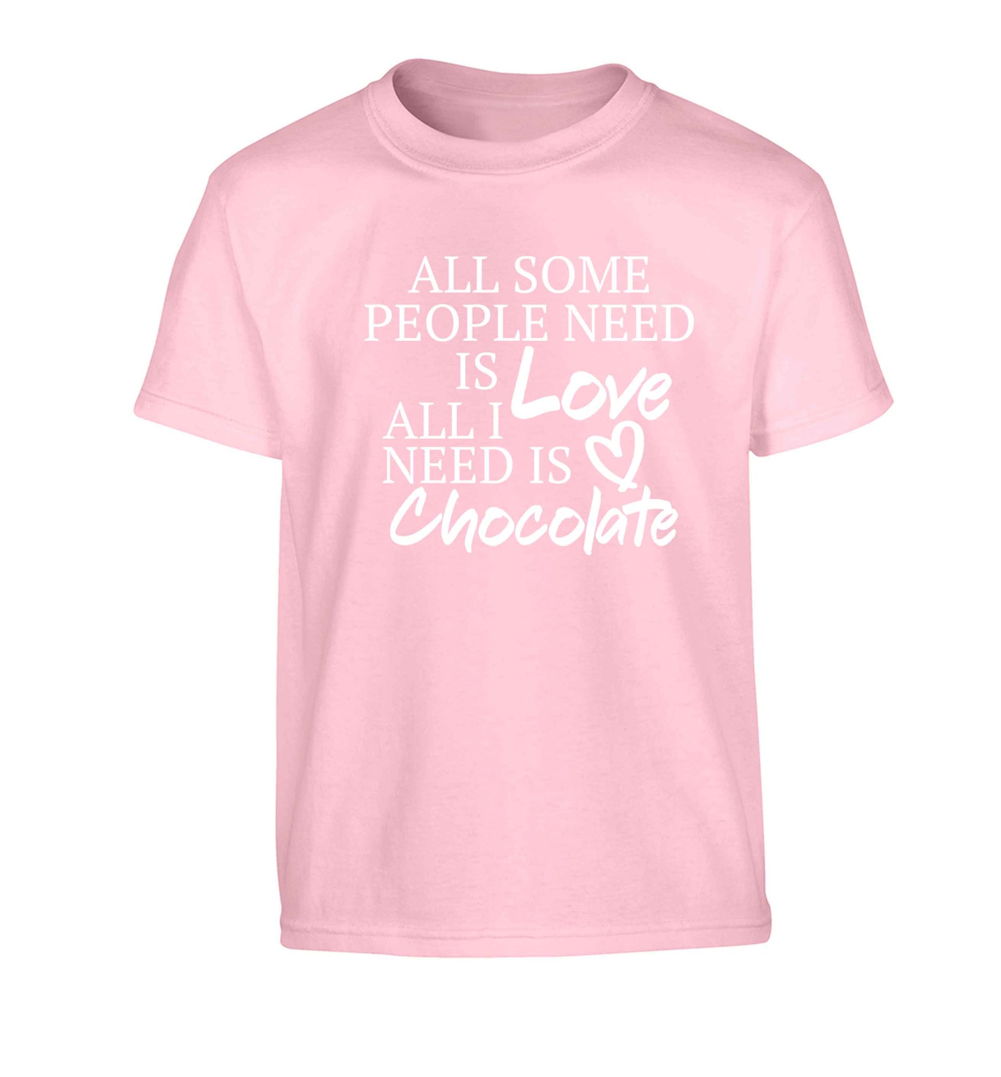 All some people need is love all I need is chocolate Children's light pink Tshirt 12-13 Years