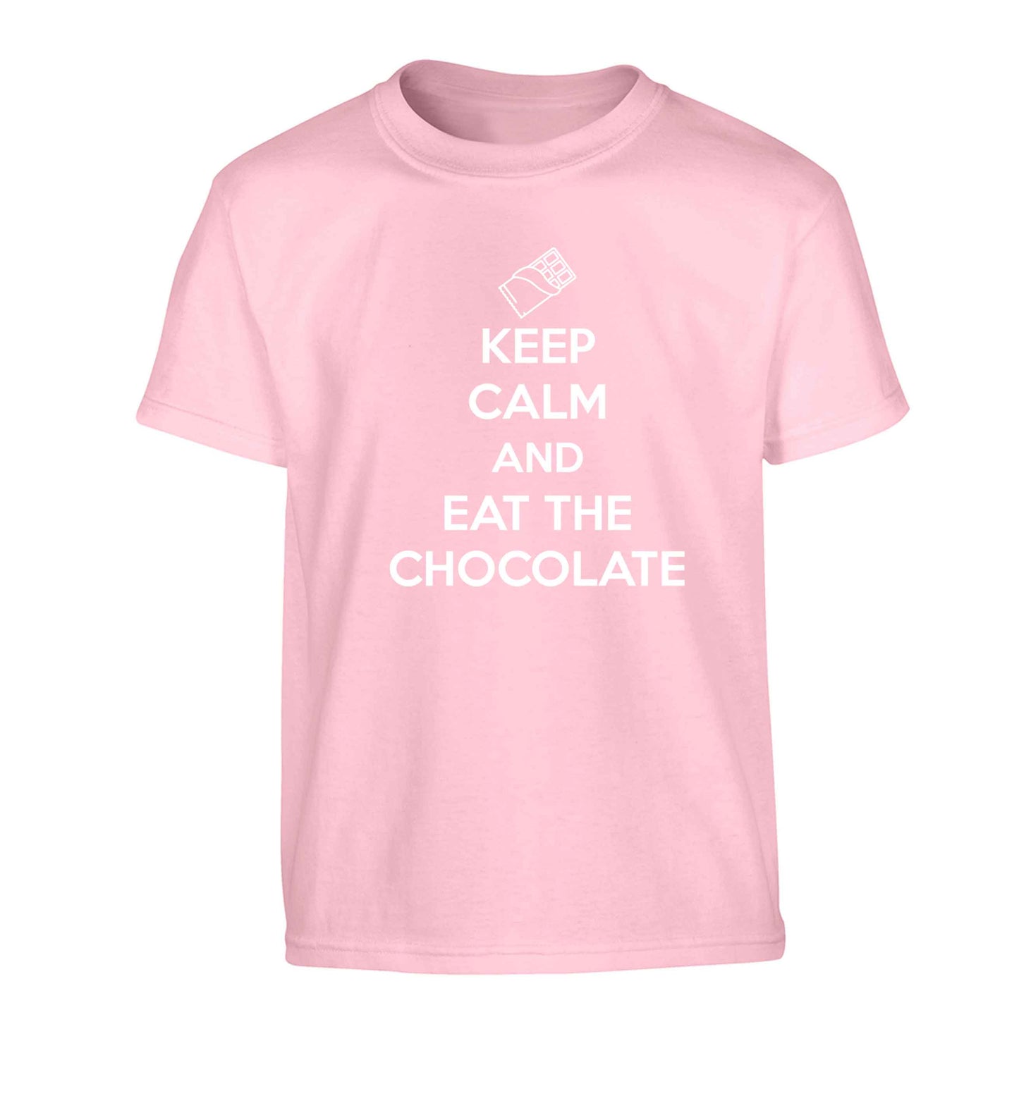 funny gift for a chocaholic! Keep calm and eat the chocolate Children's light pink Tshirt 12-13 Years