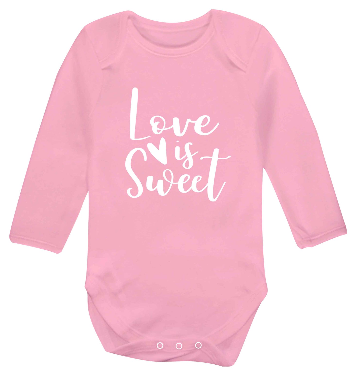 Love really does make the world go round! Ideal for weddings, valentines or just simply to show someone you love them! baby vest long sleeved pale pink 6-12 months
