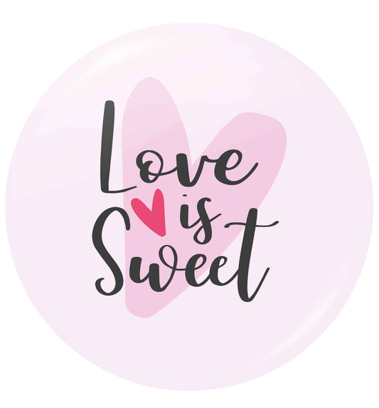Love really does make the world go round! Ideal for weddings, valentines or just simply to show someone you love them!  small 25mm Pin badge