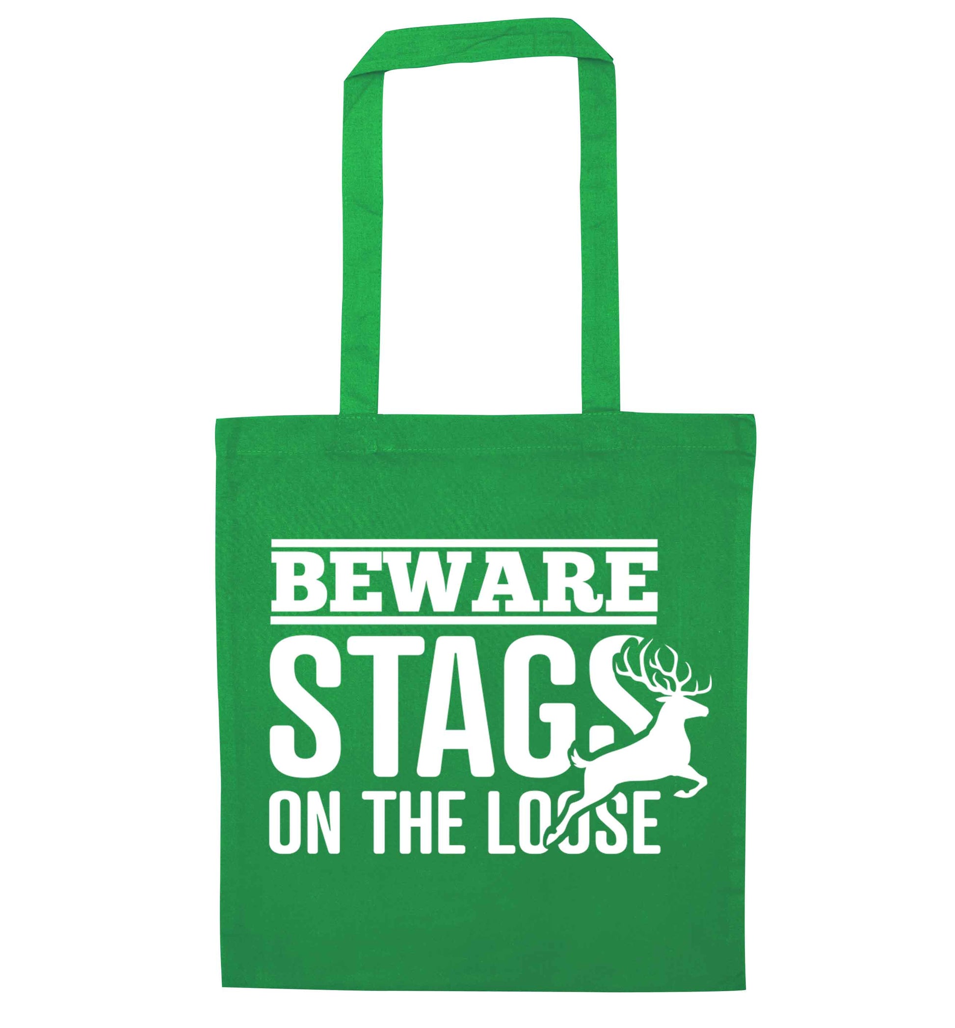 Beware stags on the loose green tote bag