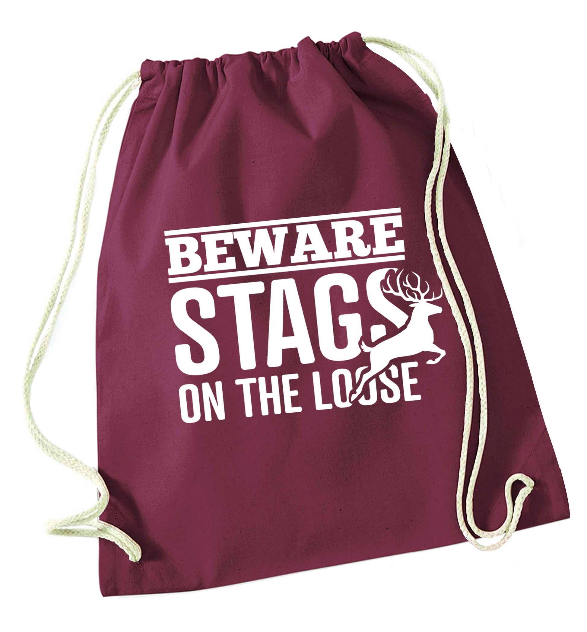 Beware stags on the loose maroon drawstring bag