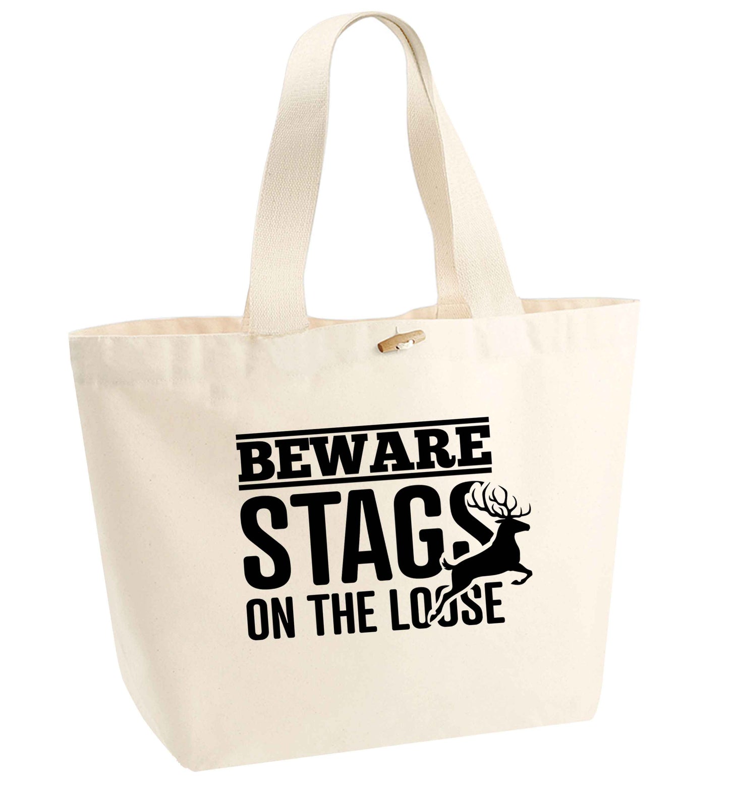 Beware stags on the loose organic cotton premium tote bag with wooden toggle in natural