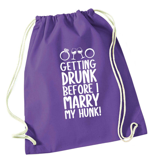 Getting drunk before I marry my hunk purple drawstring bag