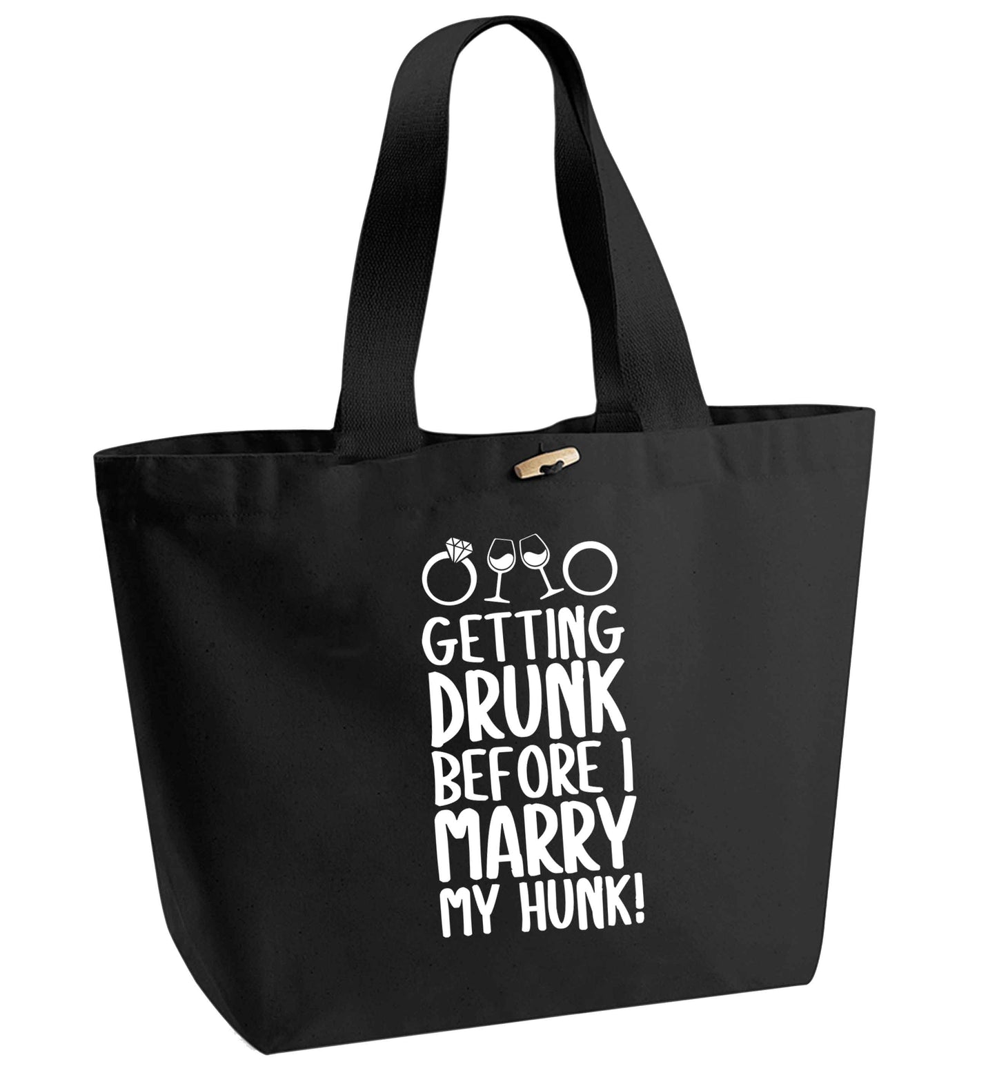 Getting drunk before I marry my hunk organic cotton premium tote bag with wooden toggle in black