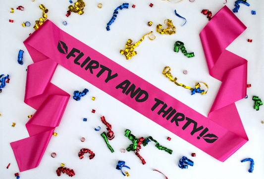 Flirty and thirty pink sash matt black text