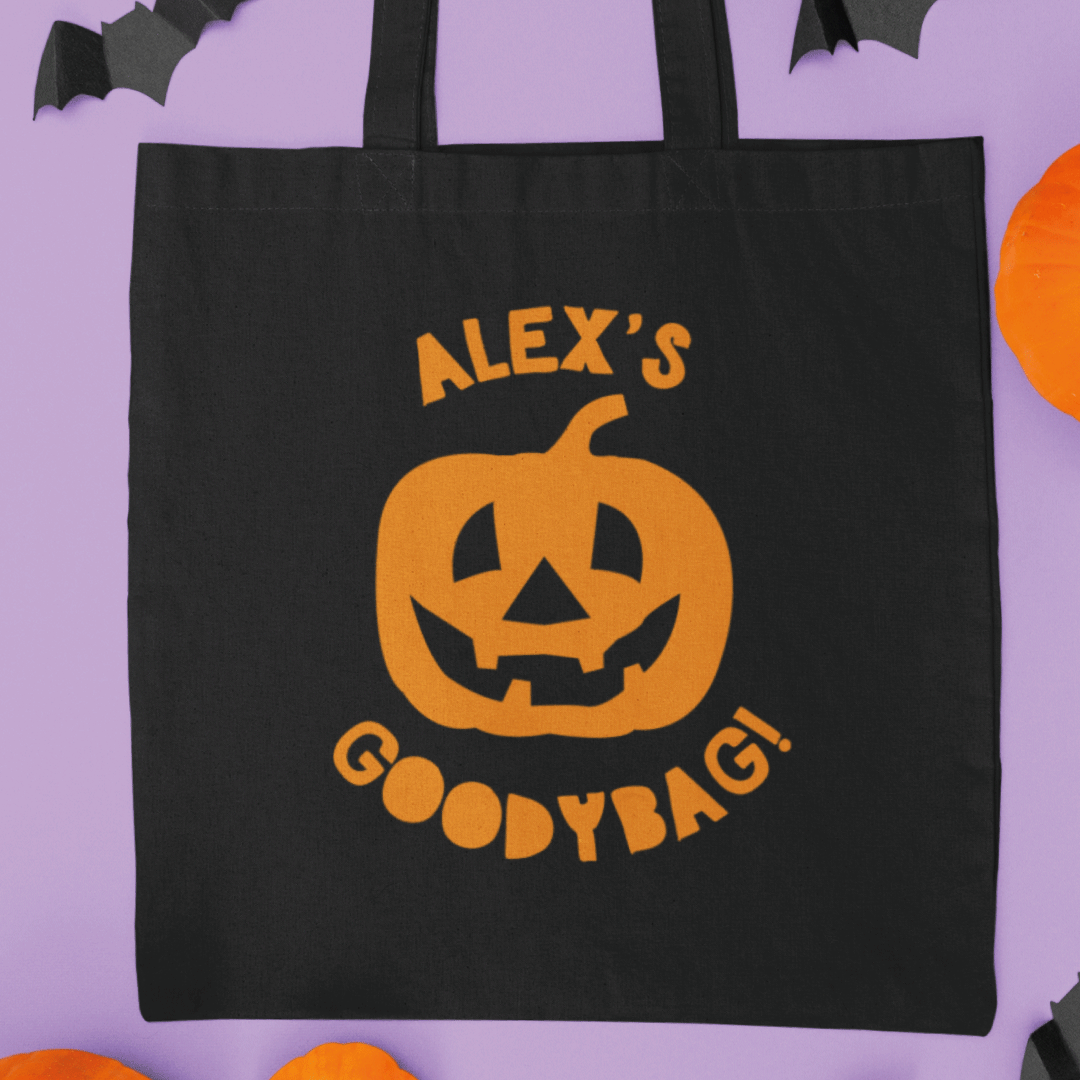 personalised halloween goodybag black tote bag with pumpkin image
