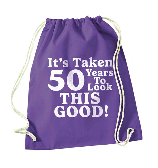 It's taken 50 years to look this good! purple drawstring bag