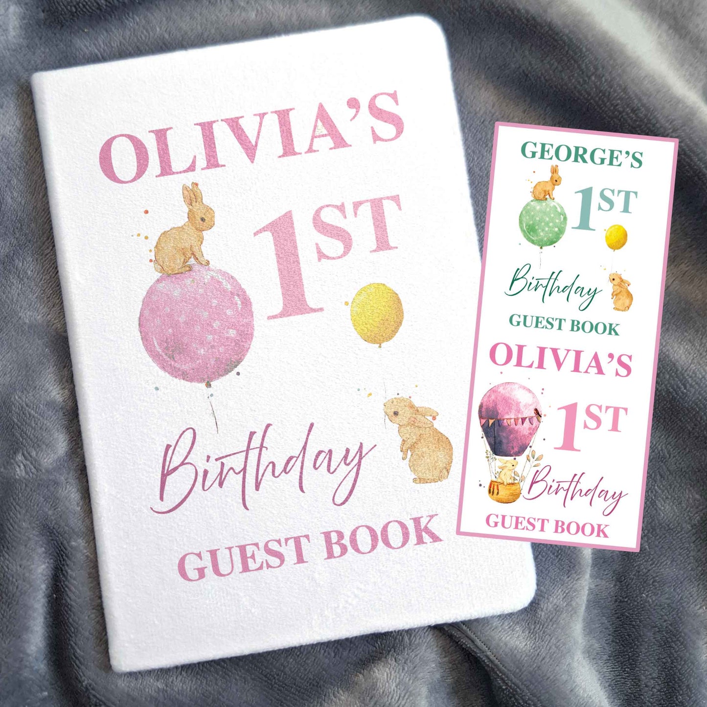 Olivia's 1st Birthday Guest Book with a watercolour image of two bunny rabbits. One on top of a pink spotty balloon and the other one looking up. Two alternative designs are also shown one in a green theme with a rabbit and a spotty balloon and another in pink with a rabbit in a hot air balloon