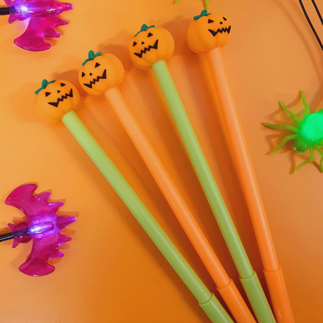 Novelty orange and green Halloween pens with a Pumpkin topper 