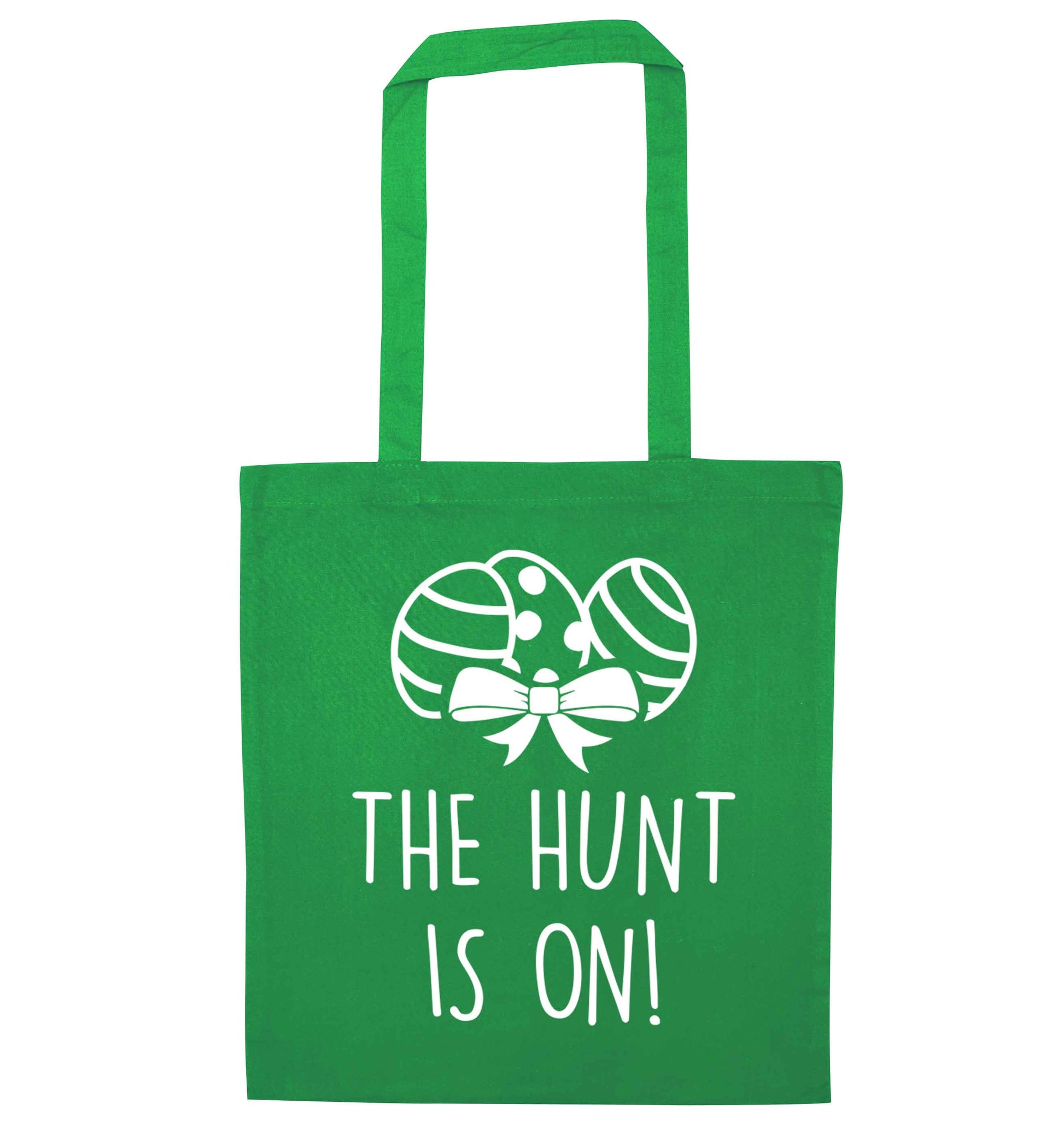 The hunt is on green tote bag