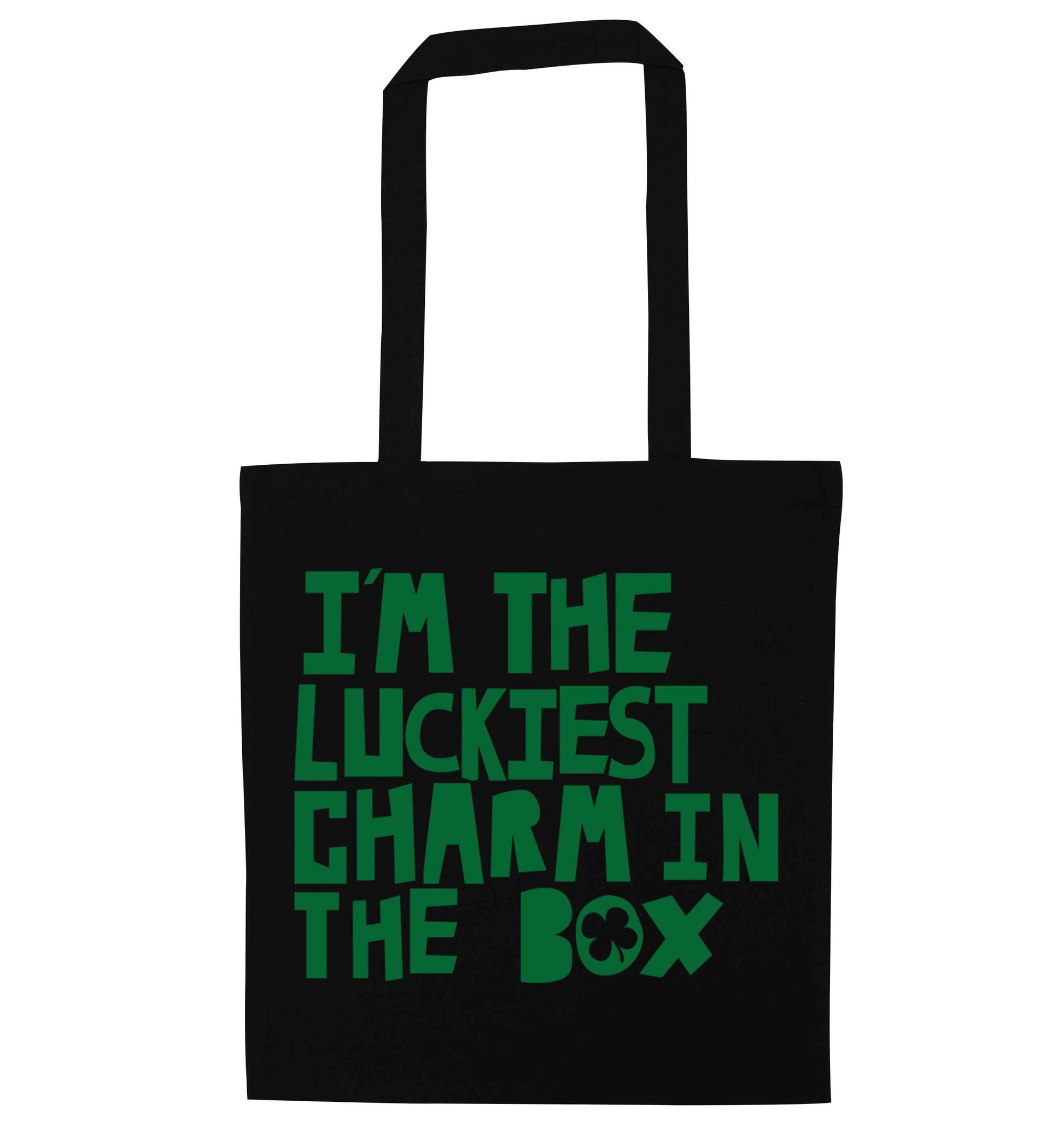 I'm the luckiest charm in the box black tote bag
