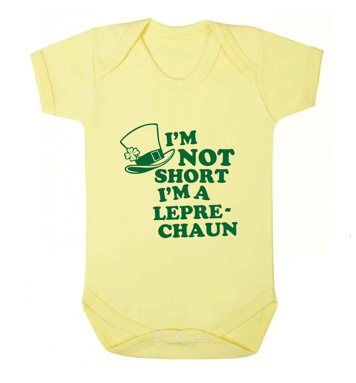 I'm not short I'm a leprechaun baby vest pale yellow 18-24 months