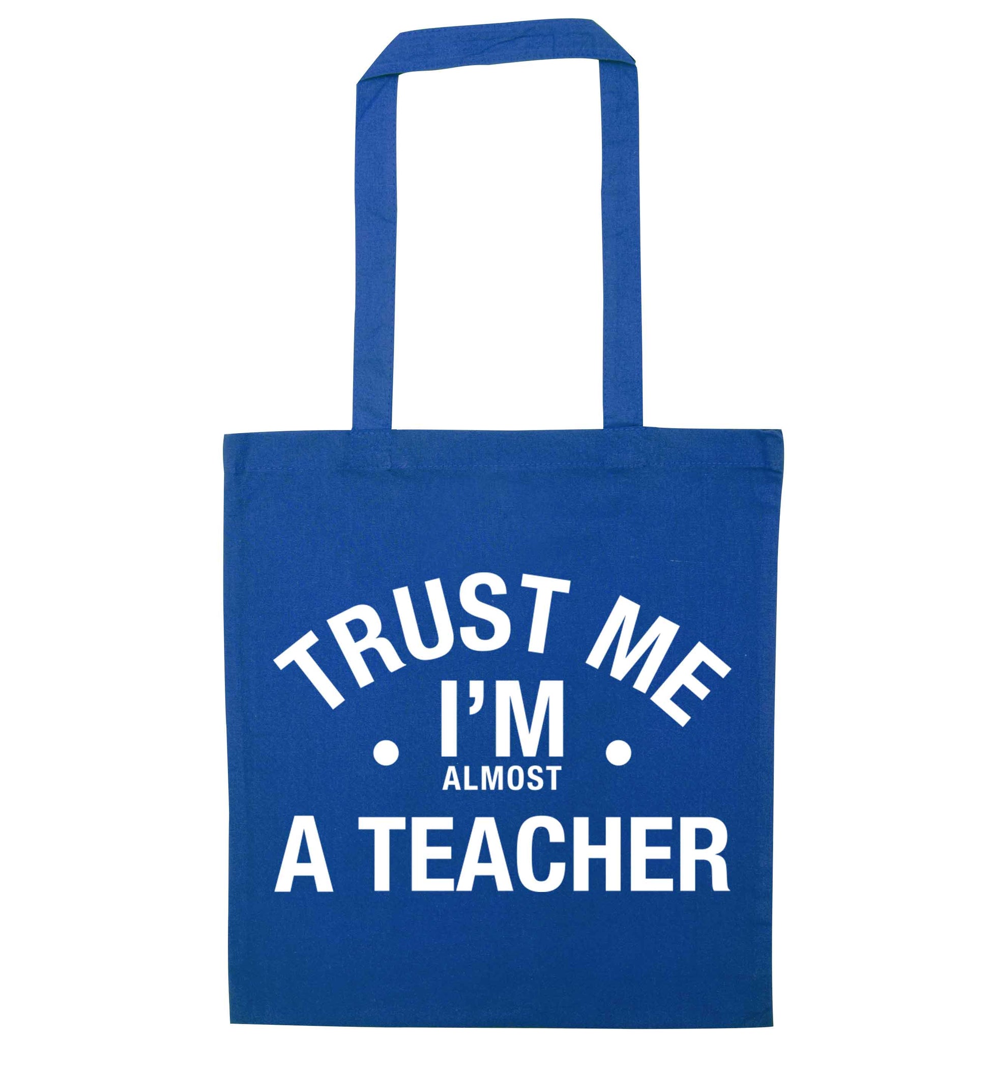 Trust me I'm almost a teacher blue tote bag