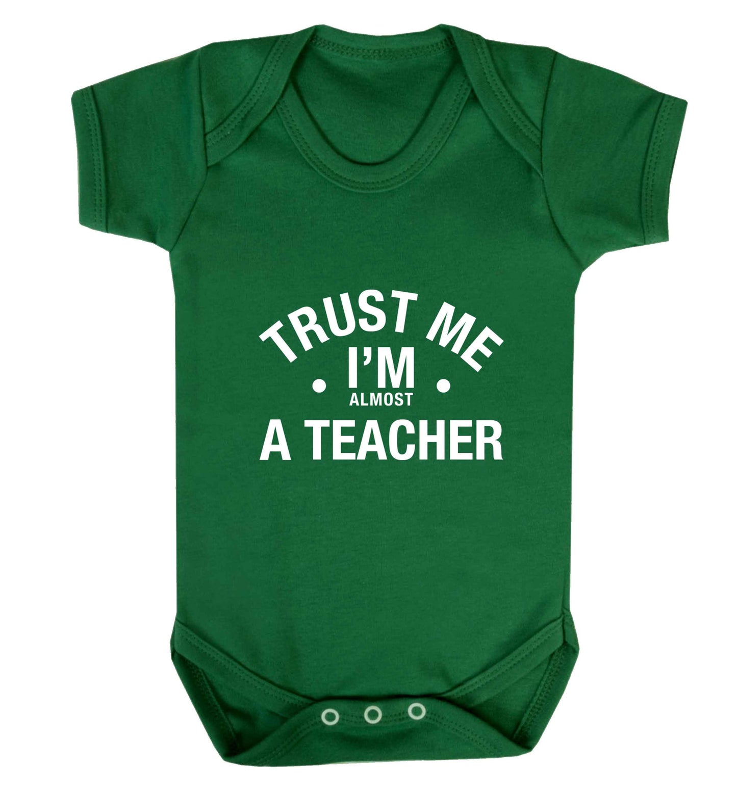 Trust me I'm almost a teacher baby vest green 18-24 months