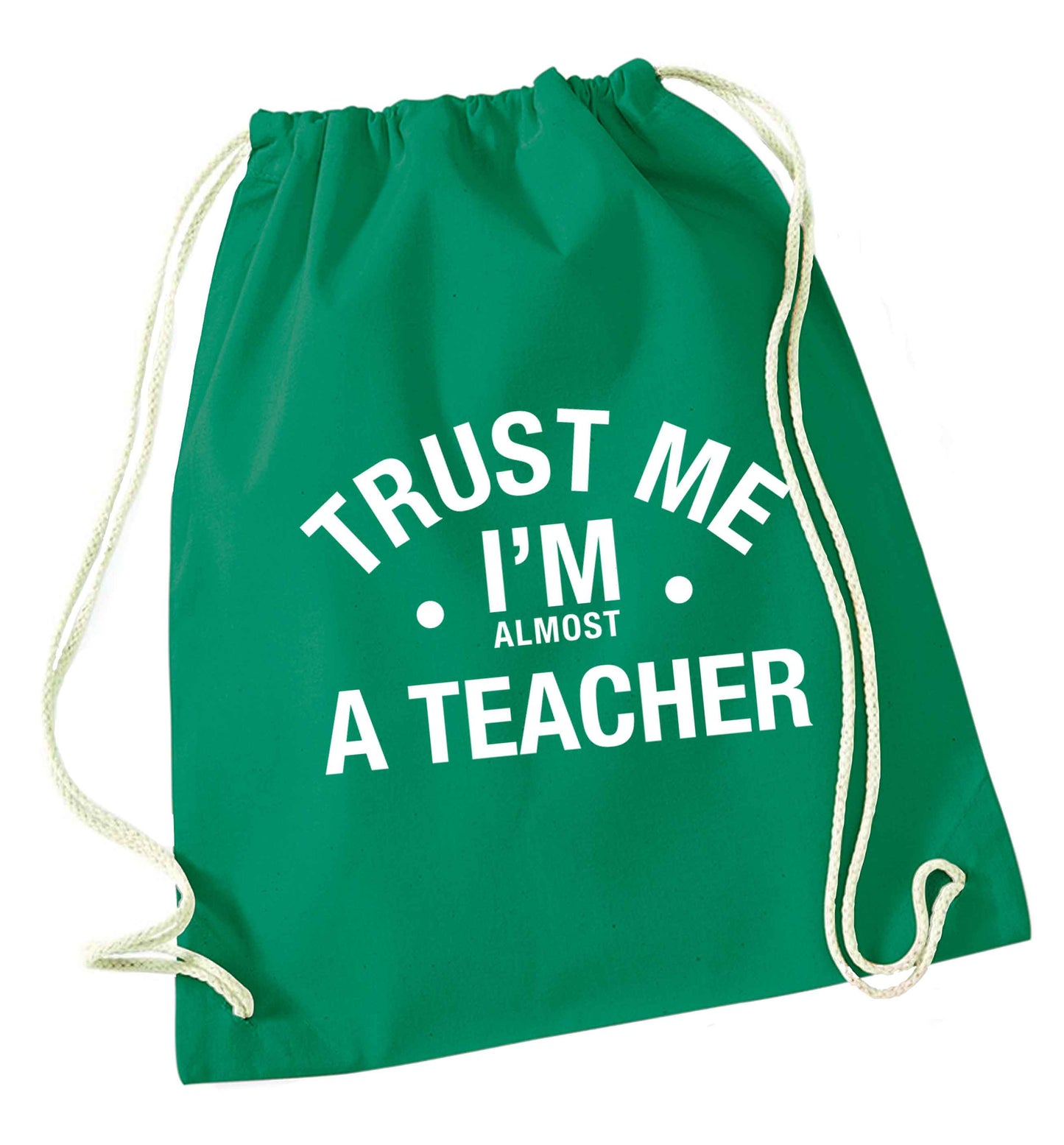 Trust me I'm almost a teacher green drawstring bag