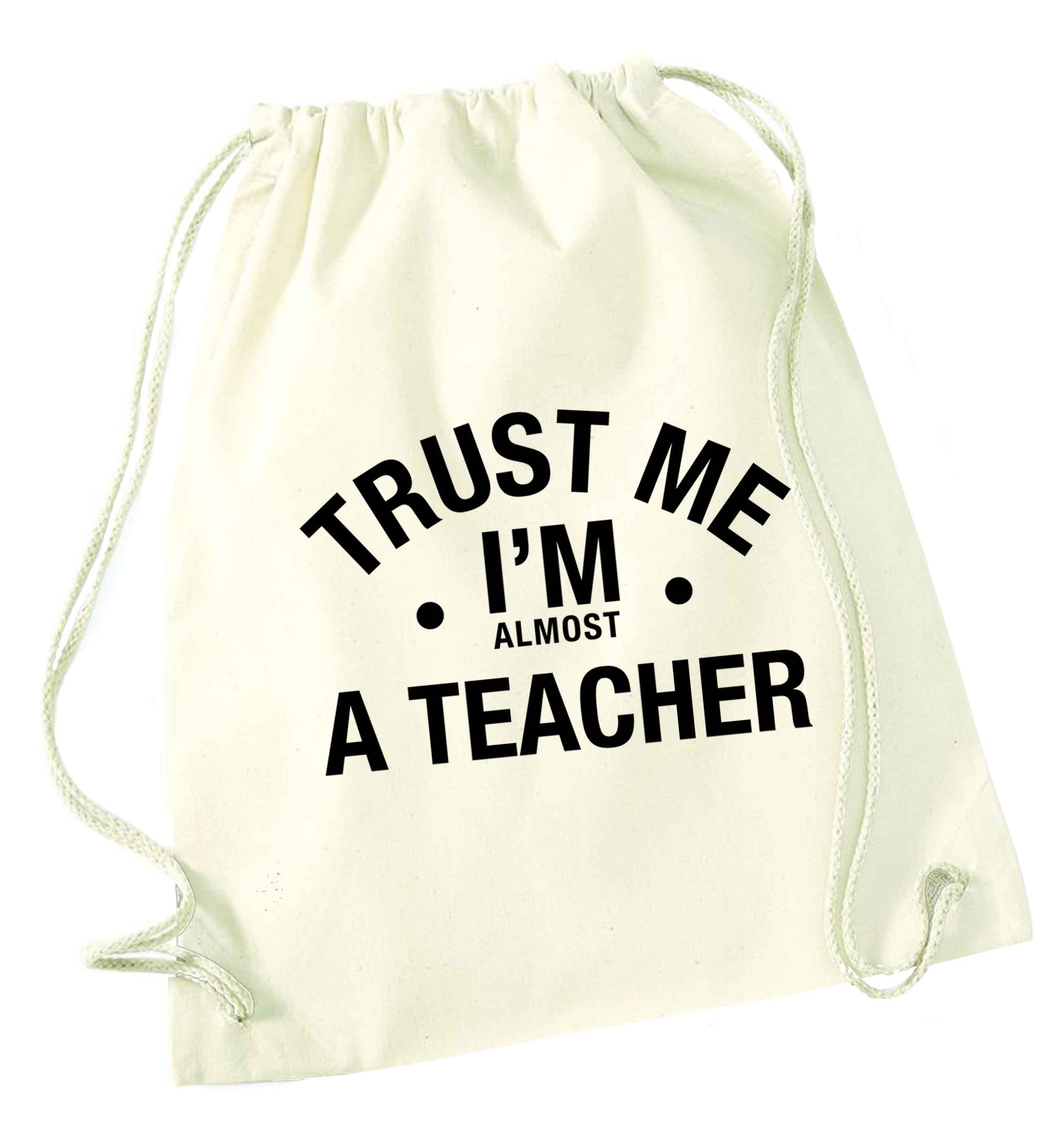 Trust me I'm almost a teacher natural drawstring bag