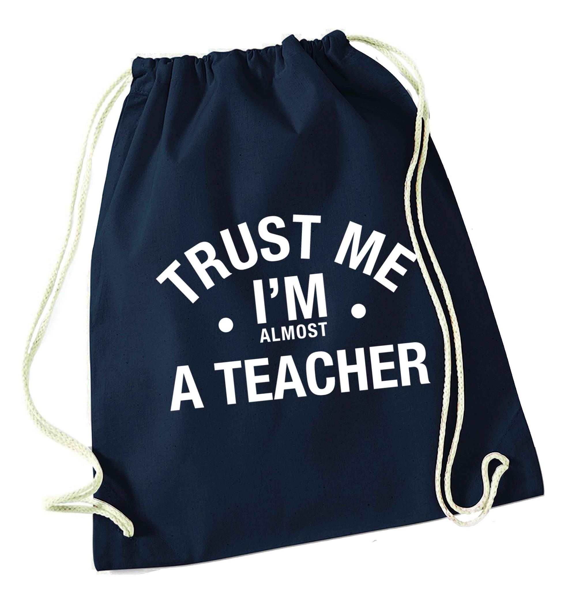 Trust me I'm almost a teacher navy drawstring bag