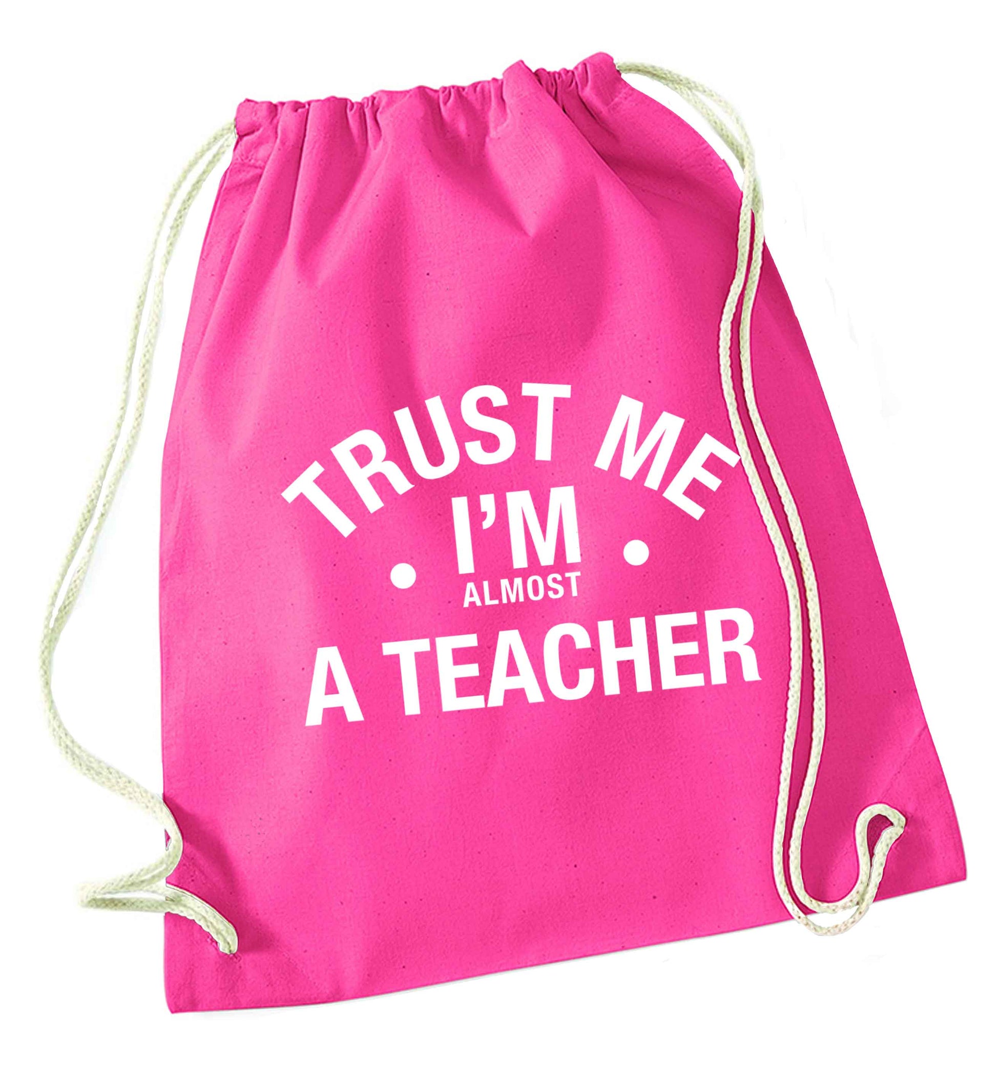 Trust me I'm almost a teacher pink drawstring bag