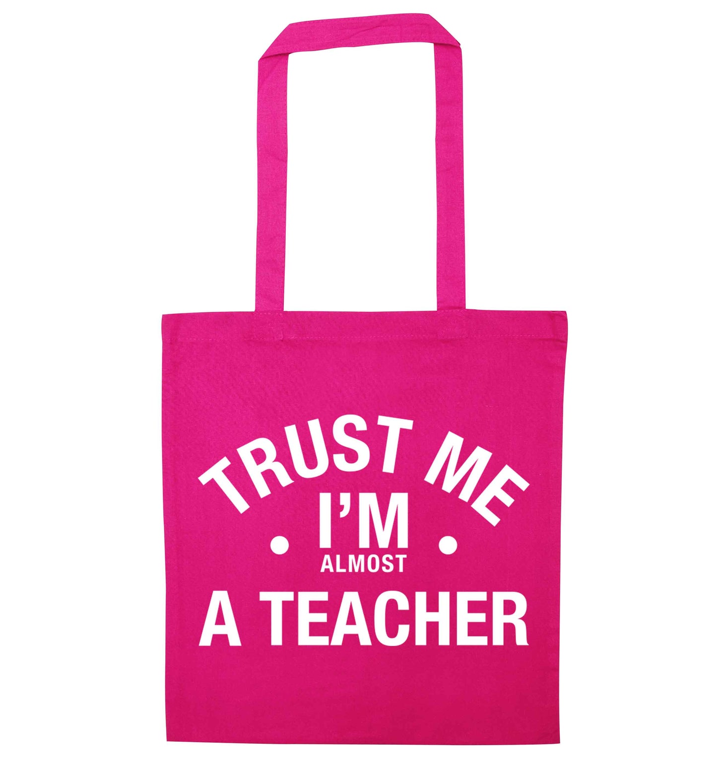 Trust me I'm almost a teacher pink tote bag