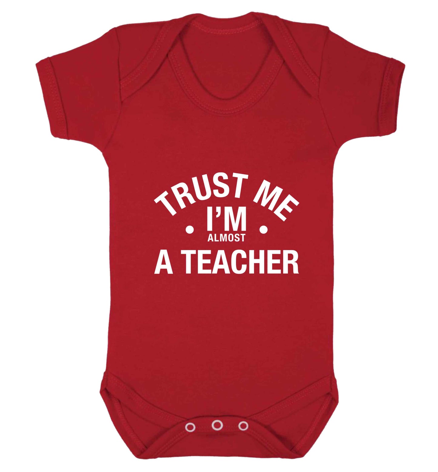 Trust me I'm almost a teacher baby vest red 18-24 months