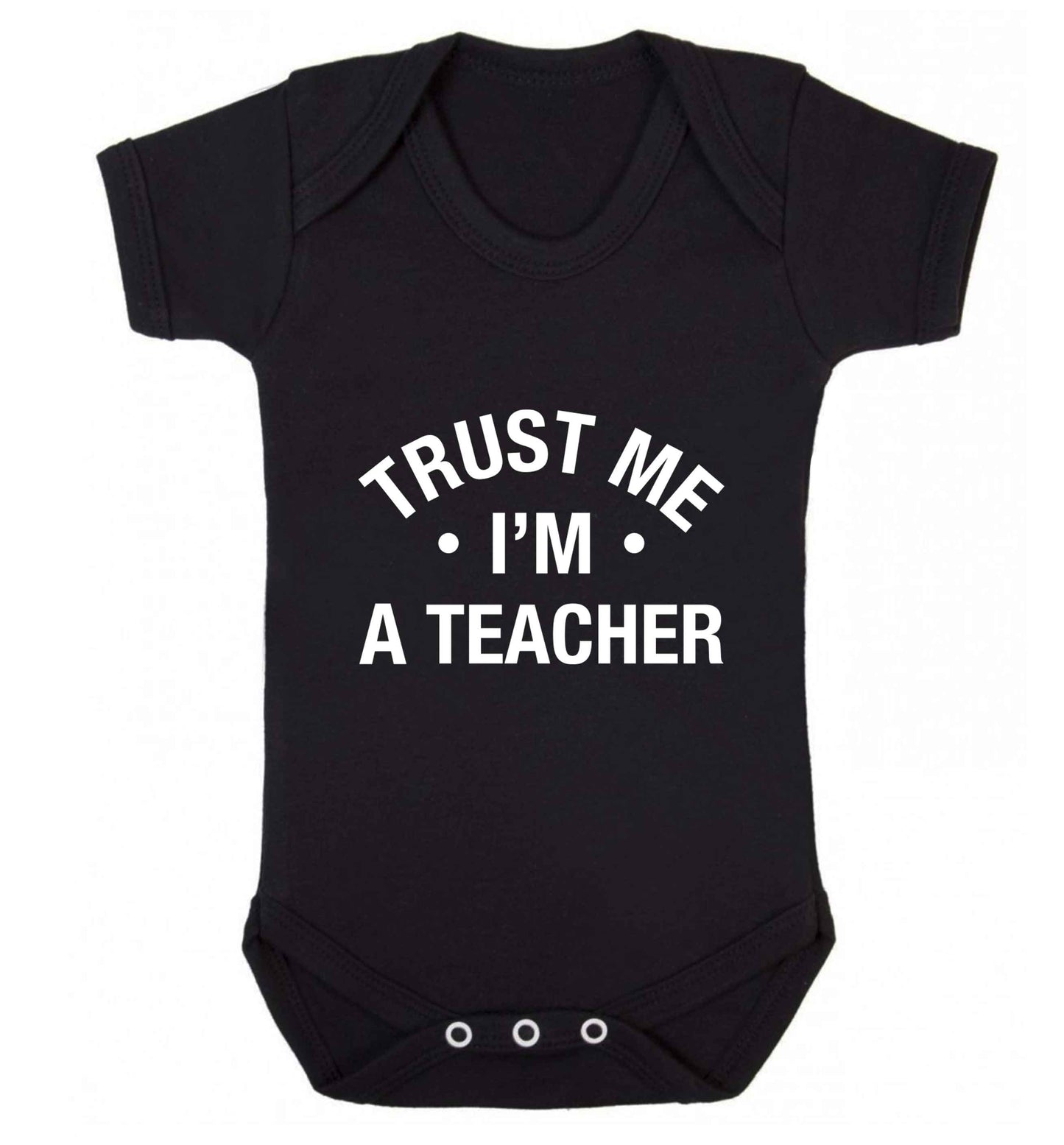 Trust me I'm a teacher baby vest black 18-24 months