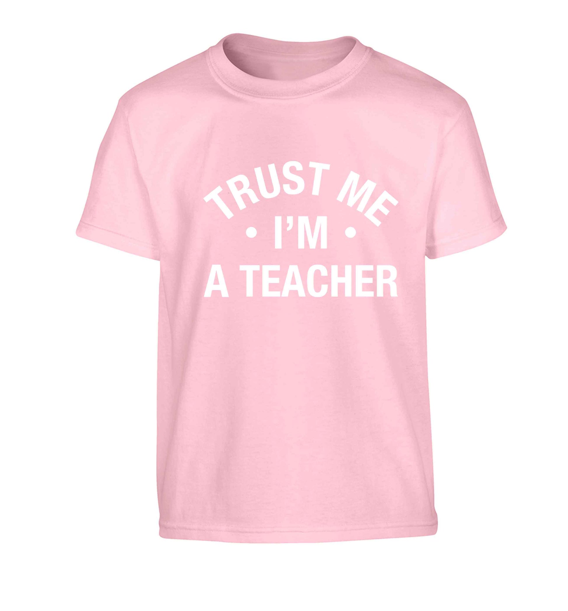 Trust me I'm a teacher Children's light pink Tshirt 12-13 Years