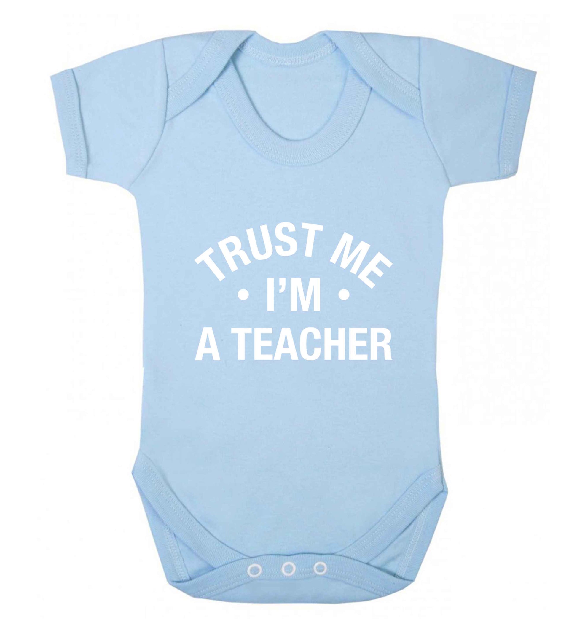 Trust me I'm a teacher baby vest pale blue 18-24 months