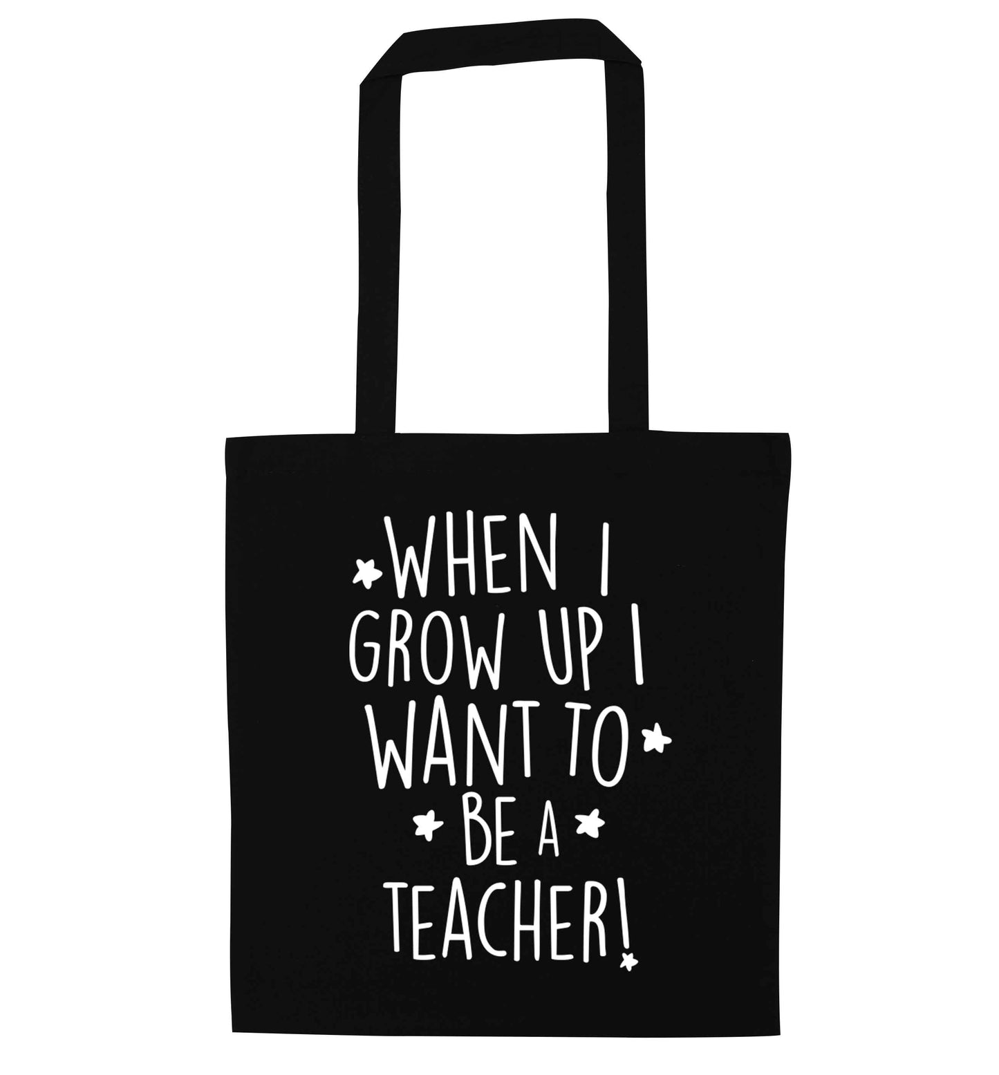 When I grow up I want to be a teacher black tote bag