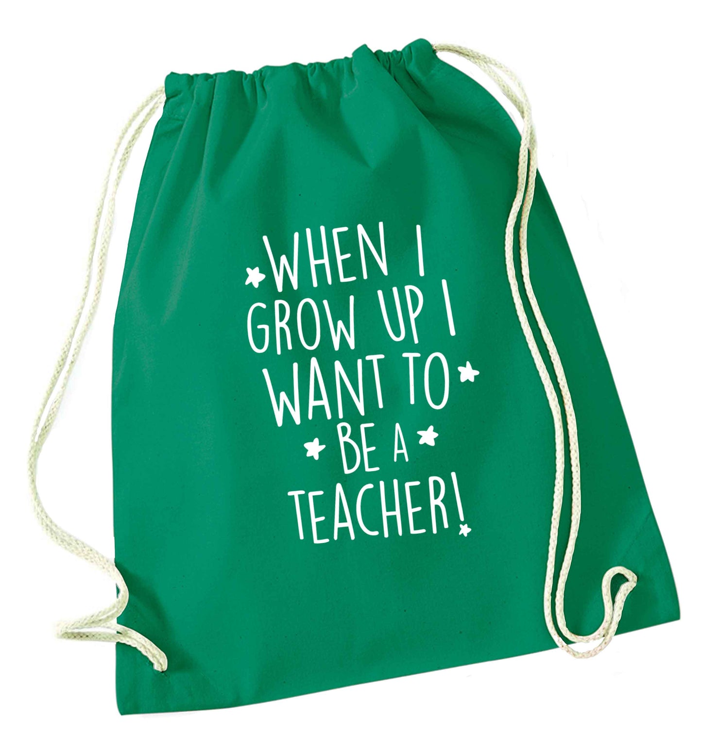 When I grow up I want to be a teacher green drawstring bag