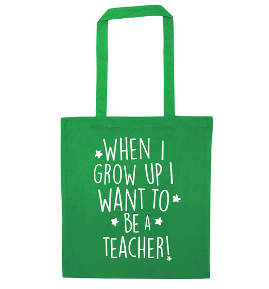 When I grow up I want to be a teacher green tote bag