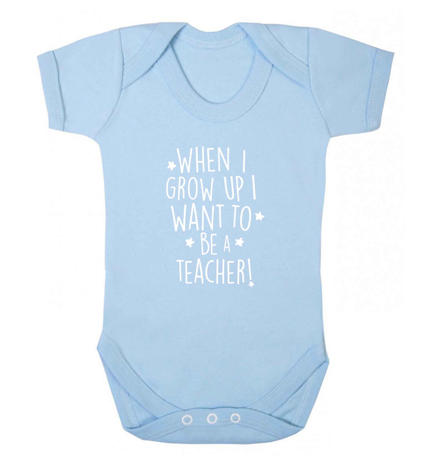 When I grow up I want to be a teacher baby vest pale blue 18-24 months