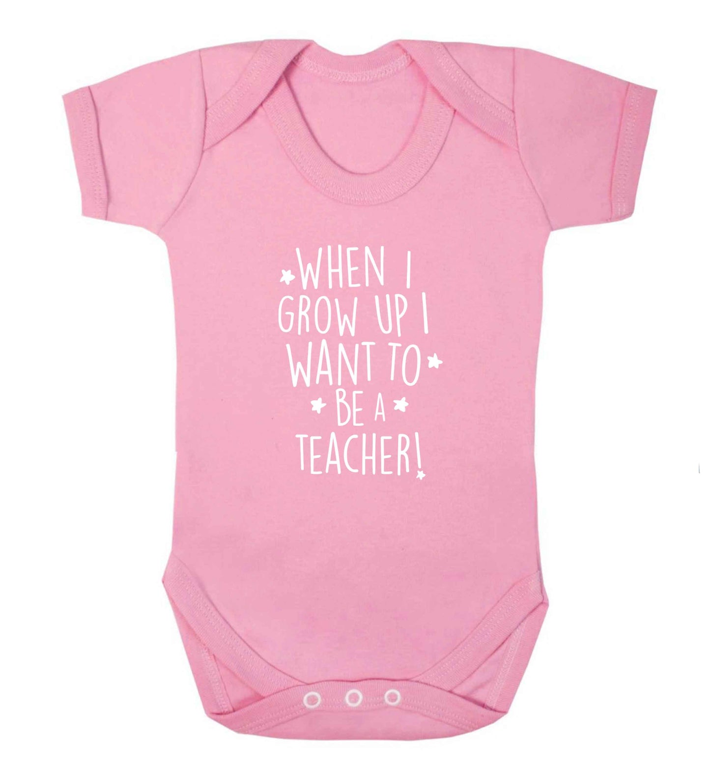 When I grow up I want to be a teacher baby vest pale pink 18-24 months