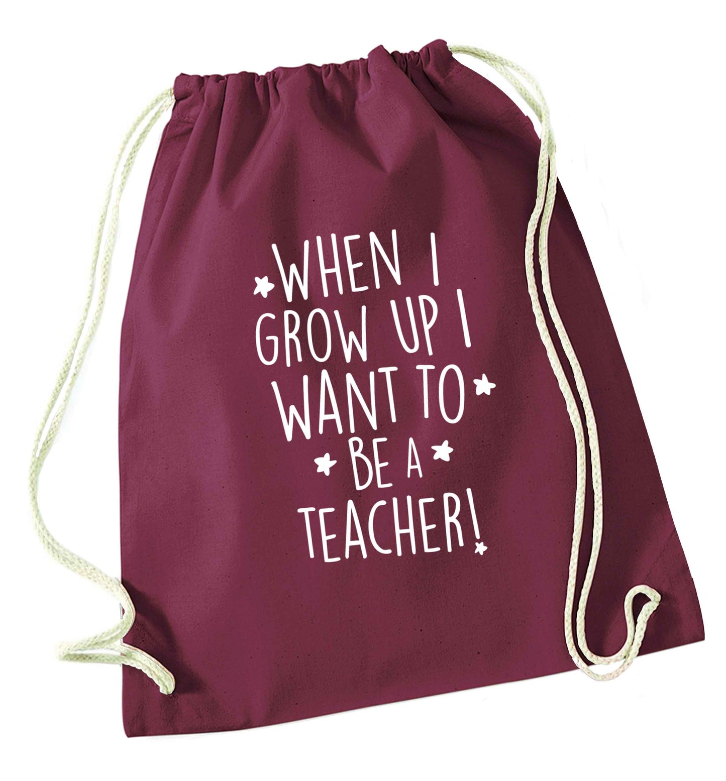 When I grow up I want to be a teacher maroon drawstring bag