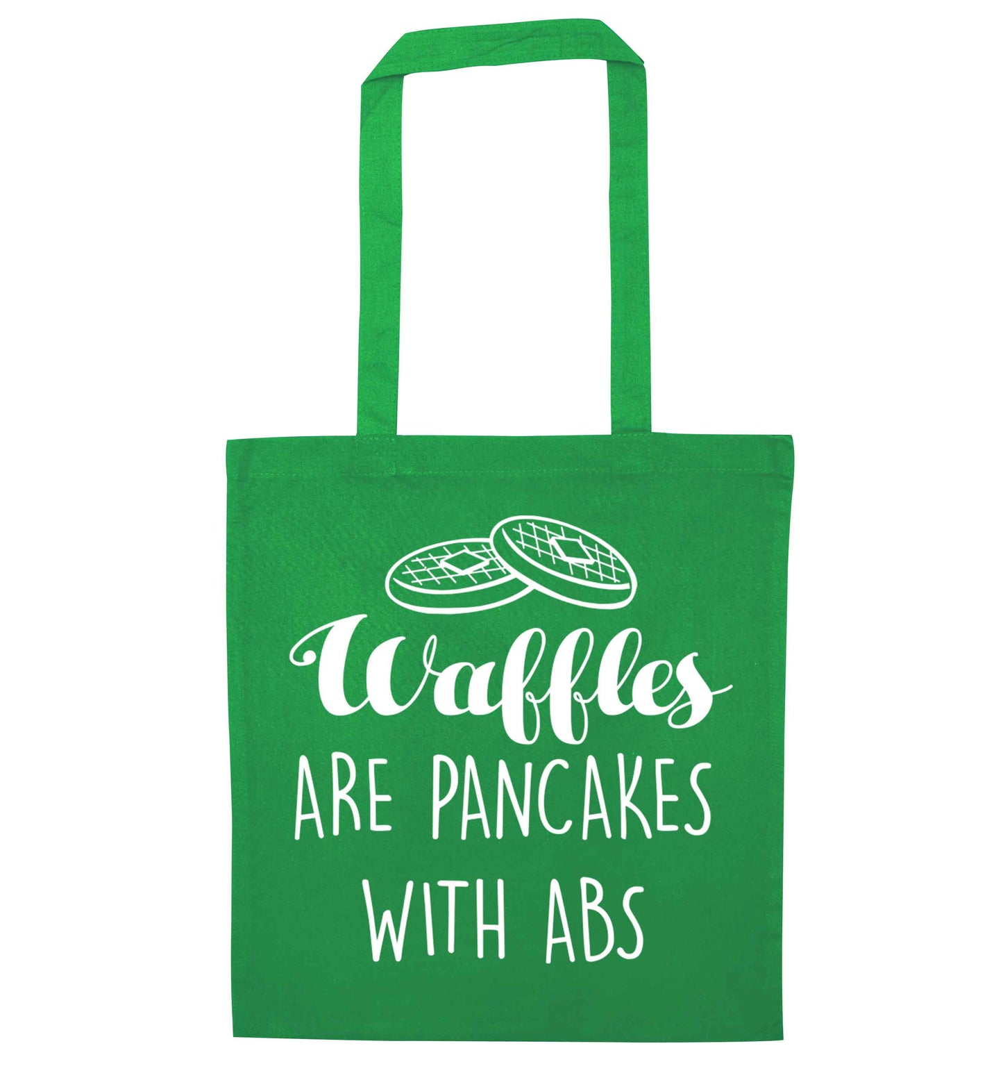 Waffles are just pancakes with abs green tote bag
