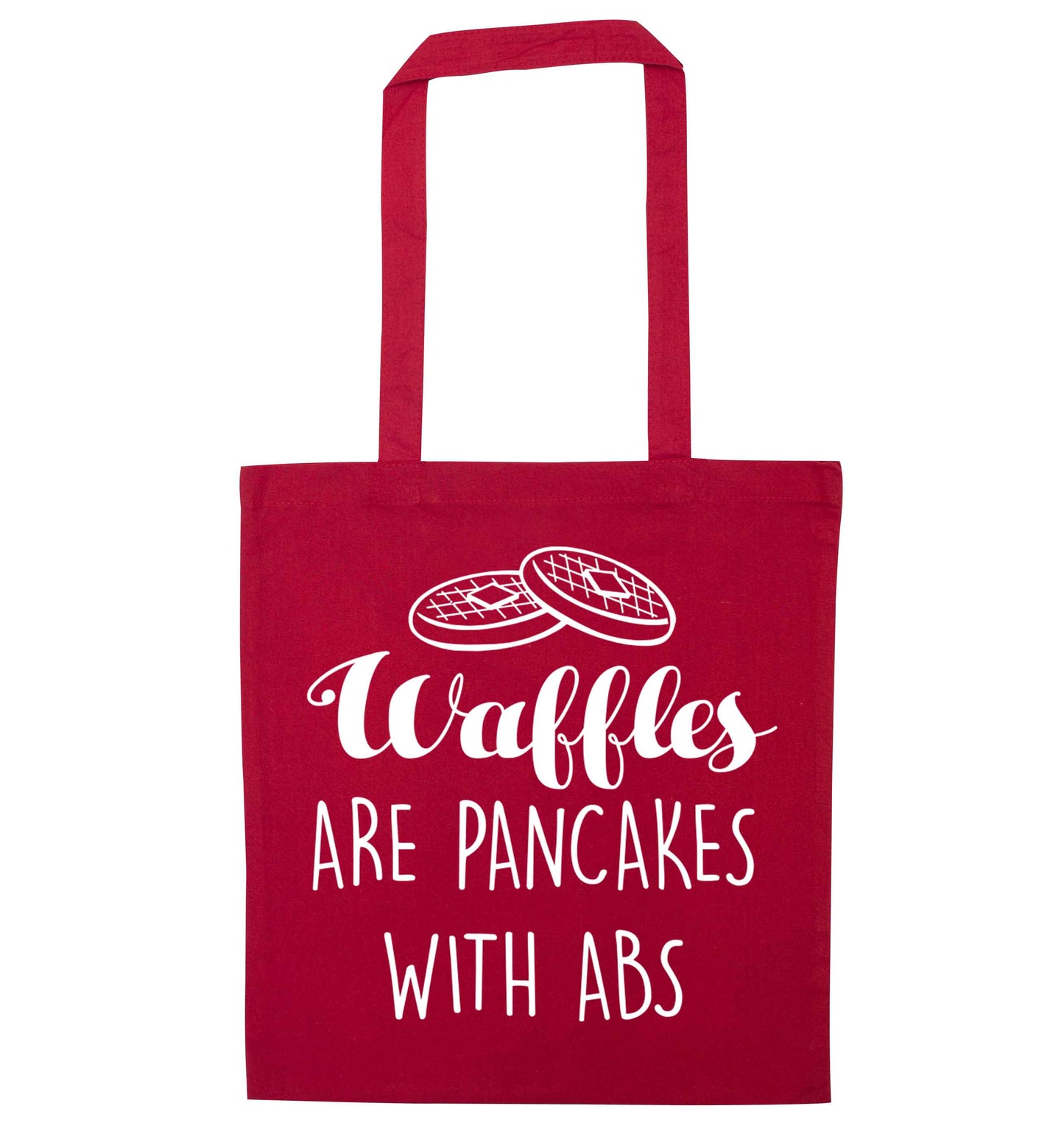 Waffles are just pancakes with abs red tote bag