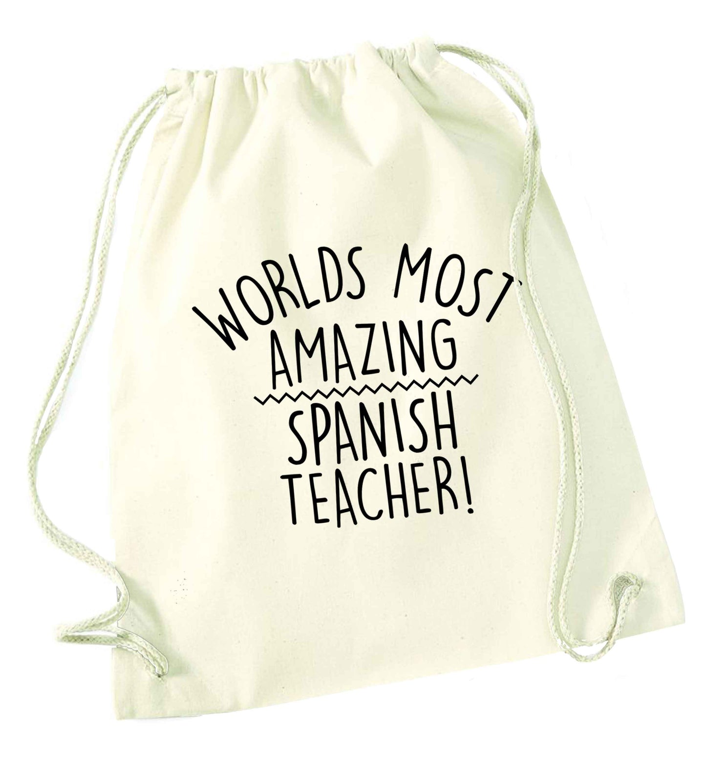 Worlds most amazing Spanish teacher natural drawstring bag