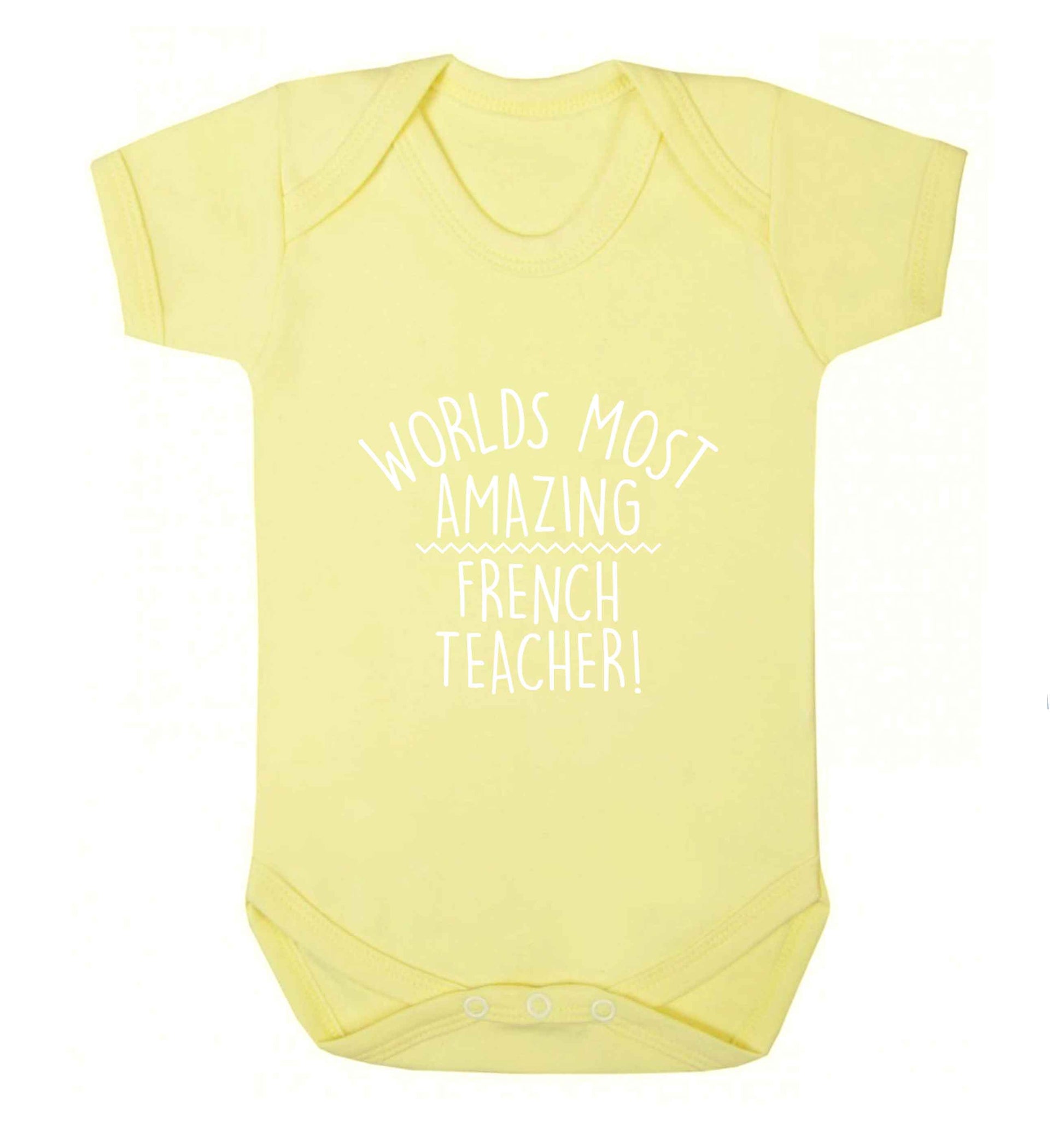 Worlds most amazing French teacher baby vest pale yellow 18-24 months