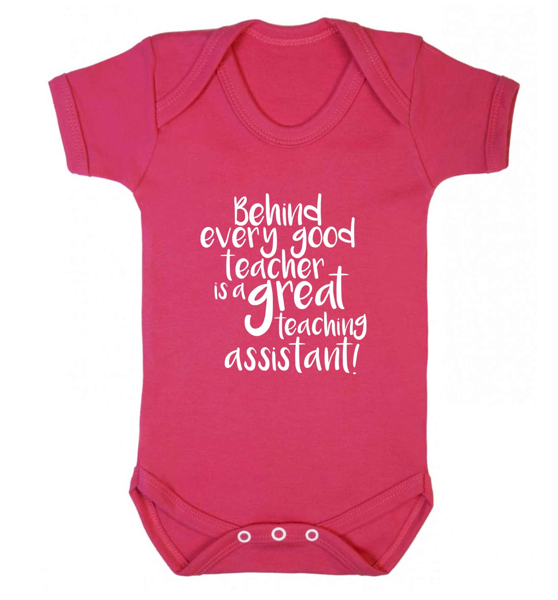 Behind every good teacher is a great teaching assistant baby vest dark pink 18-24 months