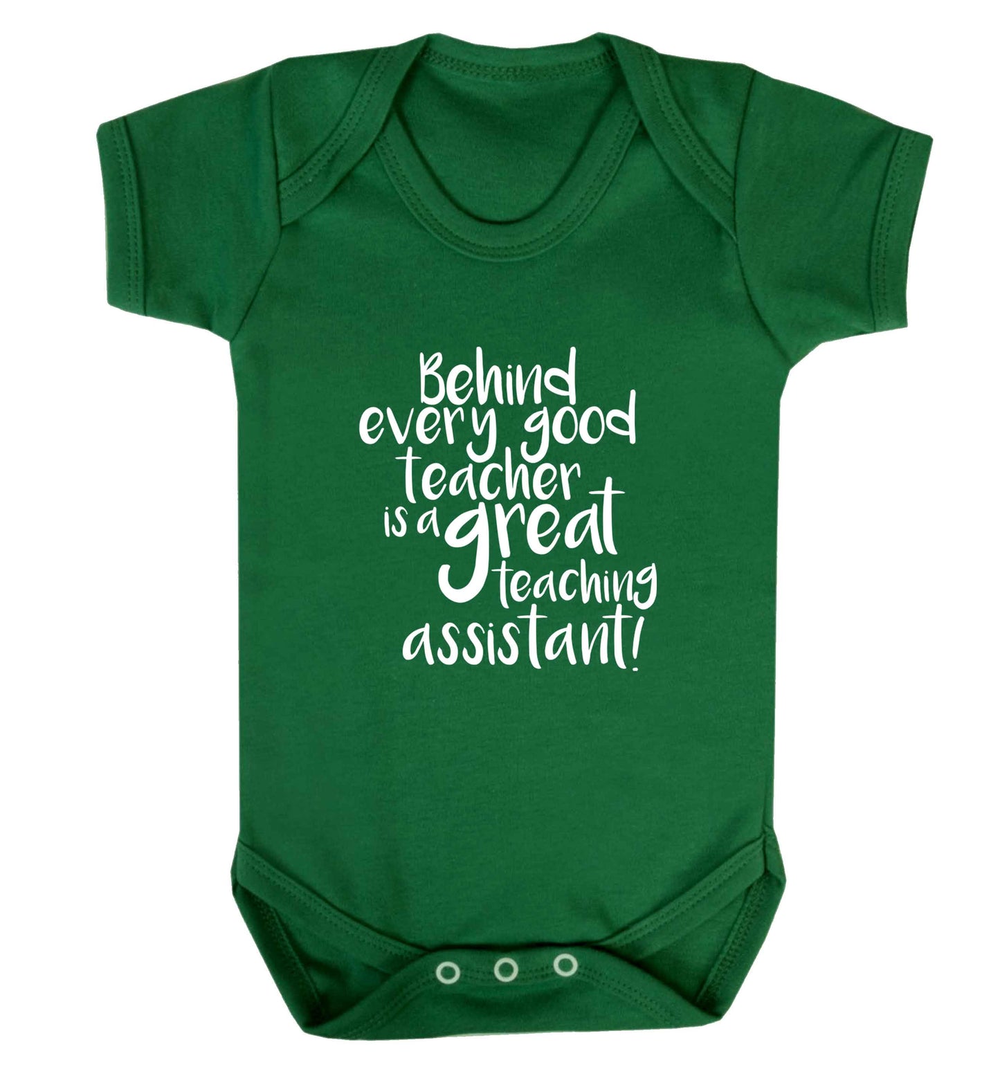 Behind every good teacher is a great teaching assistant baby vest green 18-24 months